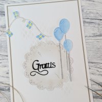 LITEN SNIRKLIG GRATTISstansmall från Gummiapan ca 35 x 21 mm