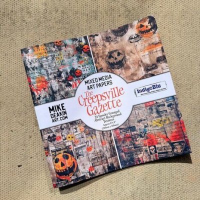 THE CREEPSVILLE GAZETTE Halloween paper pad 8x8 - Mönsterpapper från Indigoblu 20x20 cm