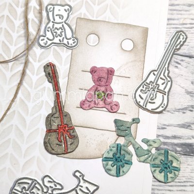 Wrapped parcels teddy bear, guitar, bicycle die set from Gummiapan ca 35,5x27,5 mm, 16x42 mm, 18x21 mm